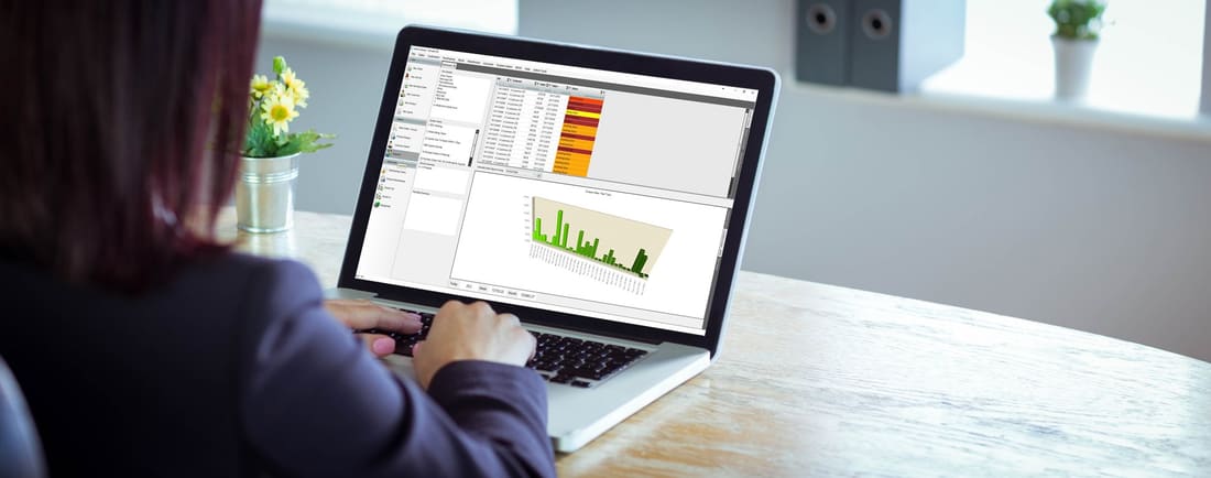 Stock Tracker dashboards and reports on a laptop